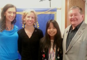 Asst. District Governor Tiffany Ervin, Past President Amber Webb, International Student Sarisa (Wan) and DG Gary Dills